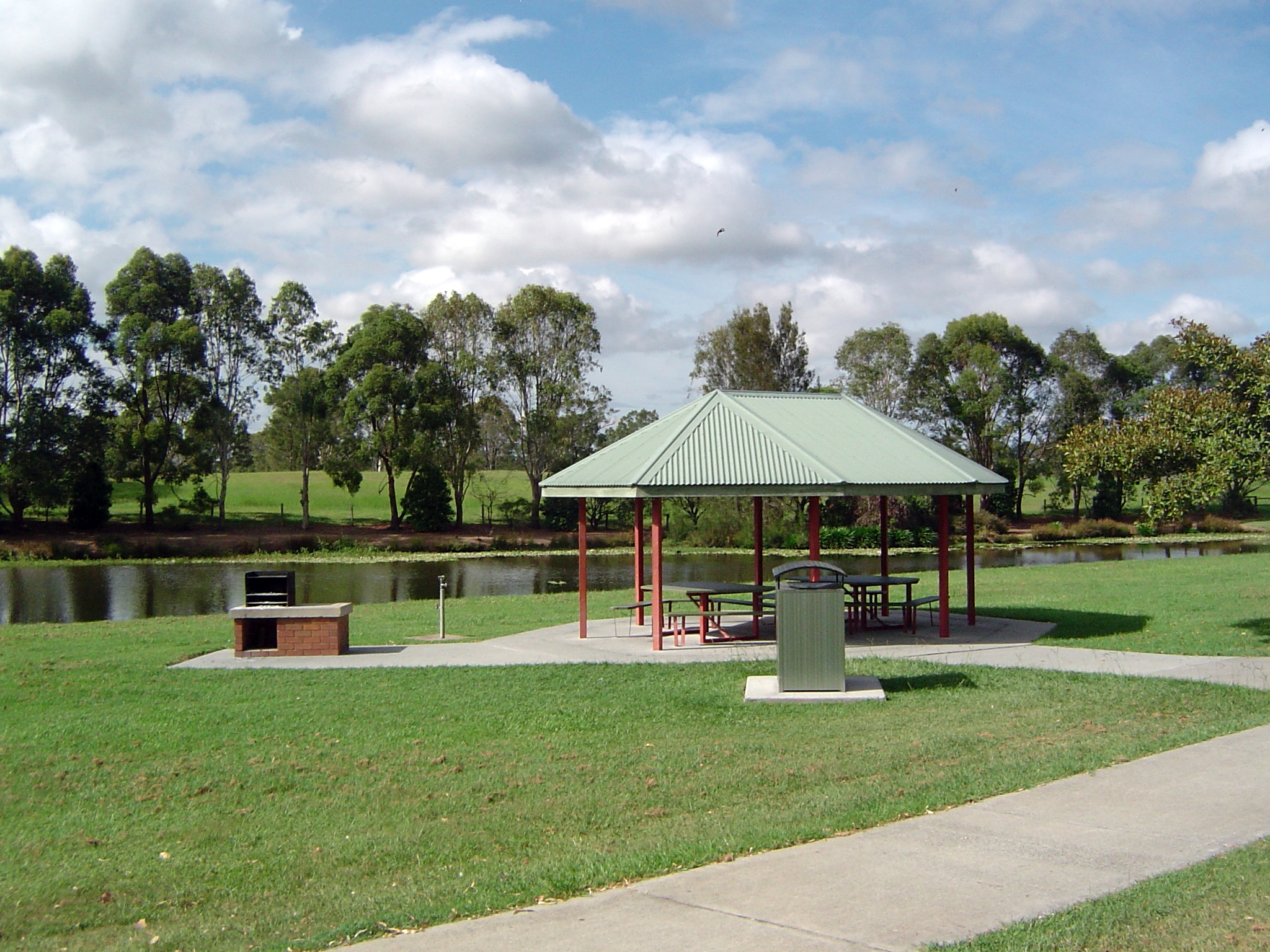 BBQ, picnic table and lagoon at Riverdale Park